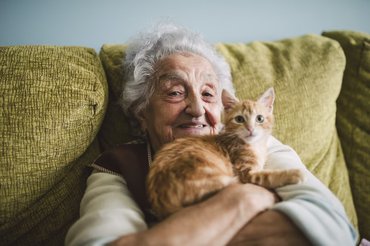 old lady with a cute cat